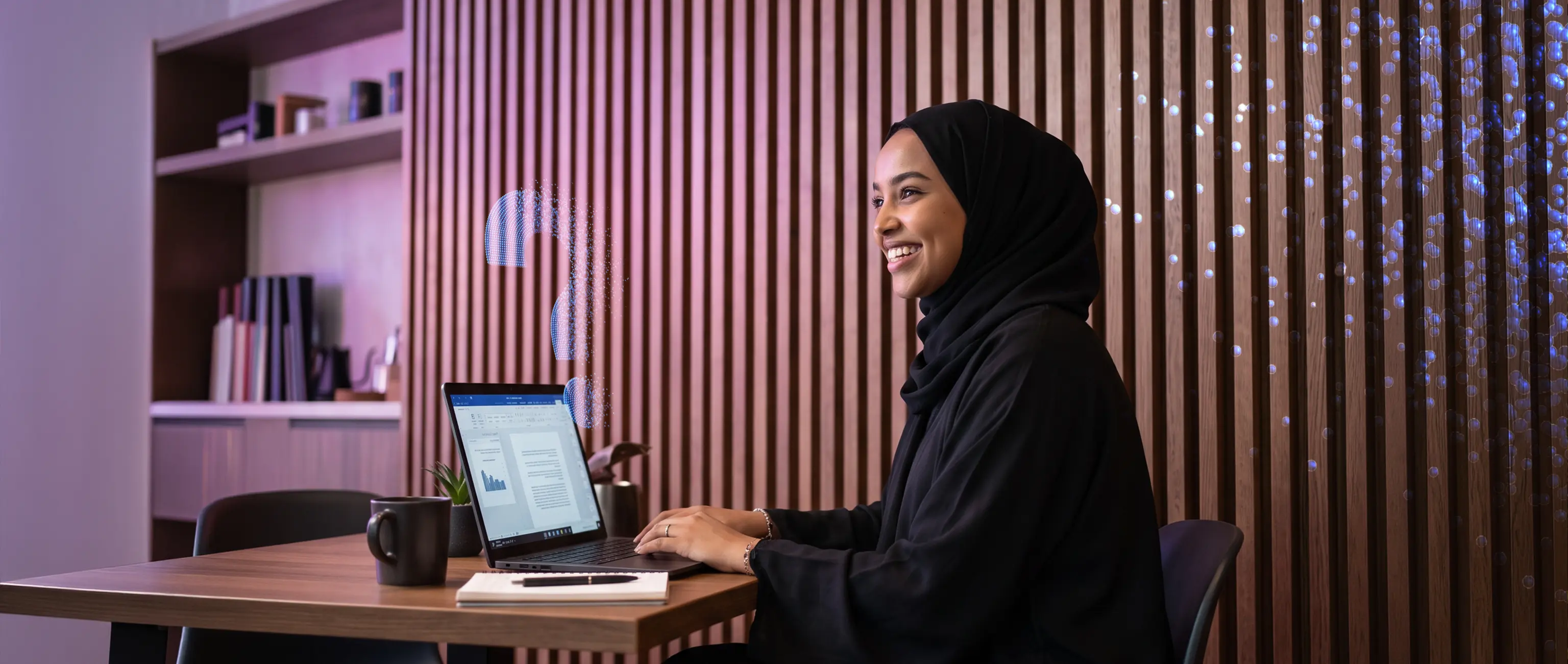 A smiling woman in a hijab working on a laptop with a glowing digital question mark, representing the Frequently Asked Questions (FAQ) section and online customer support at National Bonds.